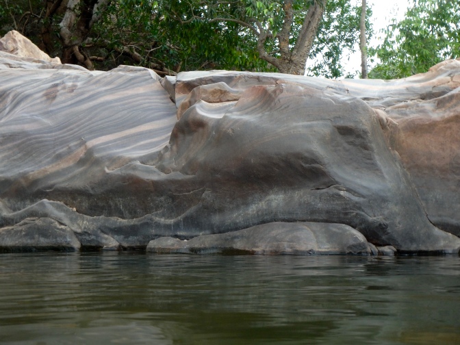 Marbled rock in water hole, Gunlom Falls Kakadu National Park